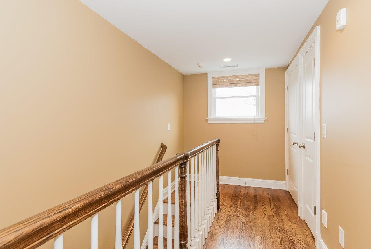44 Gower Road New Canaan, CT 06840 - Photo 34 of 53 a view of hallway with wooden floor