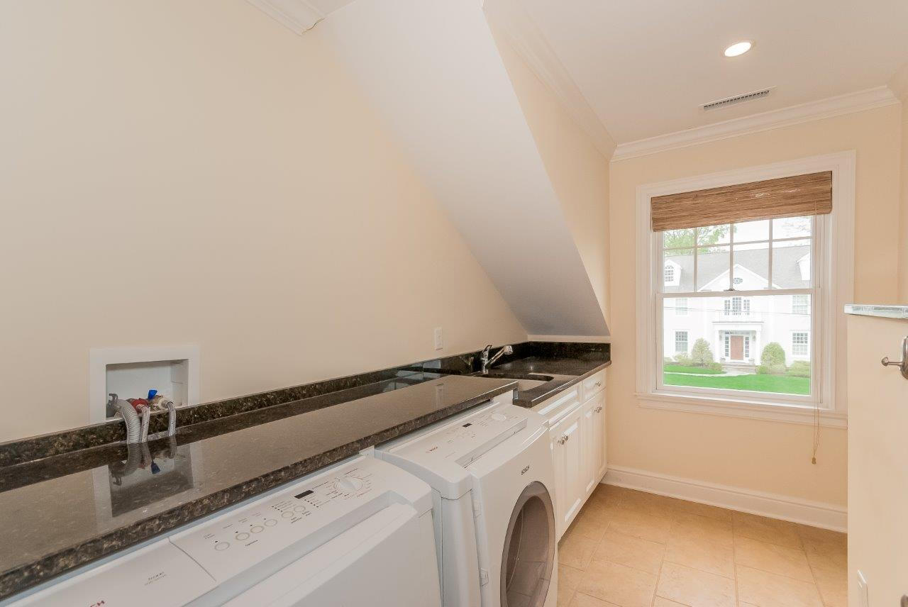 44 Gower Road New Canaan, CT 06840 - Photo 37 of 53 a utility room with dryer and washer