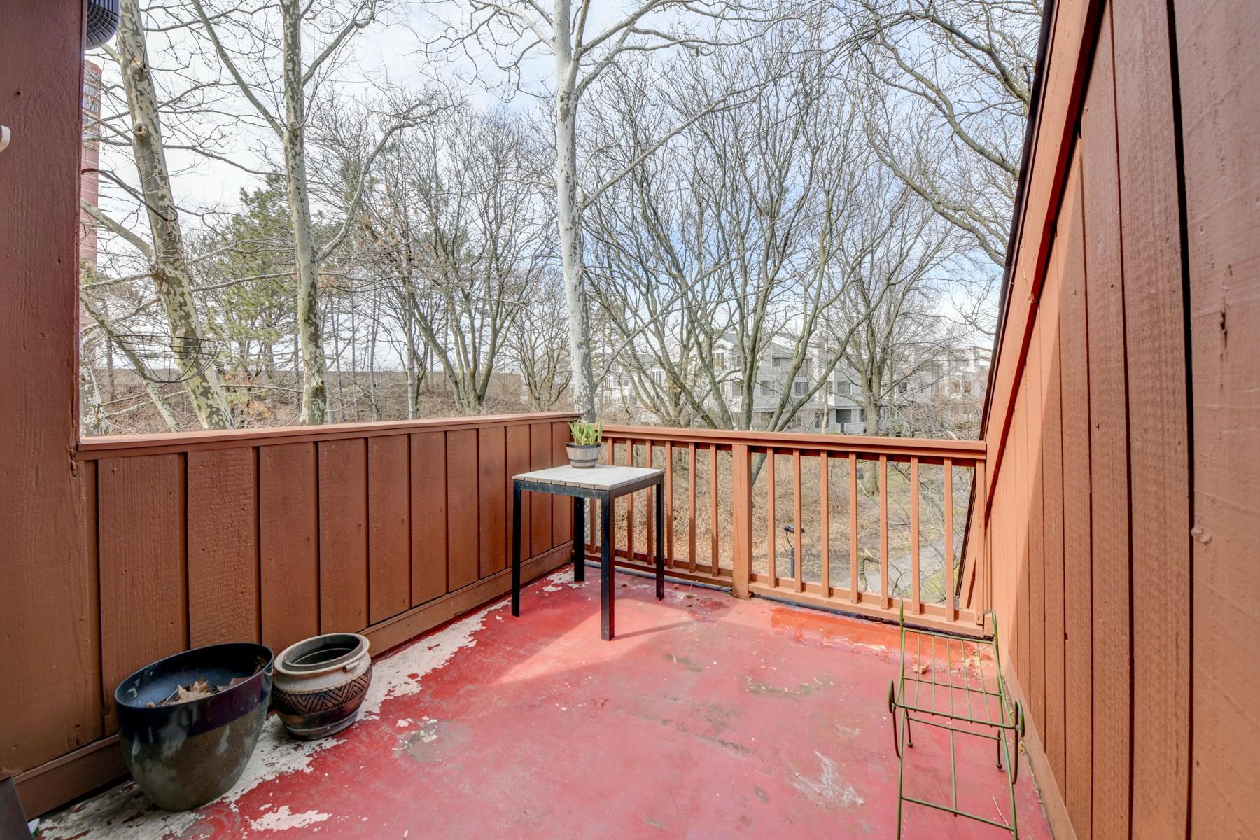 598 Sanderling Court, Unit 598 Secaucus, NJ 07094 - Photo 18 of 22 a view of a two chairs in the balcony