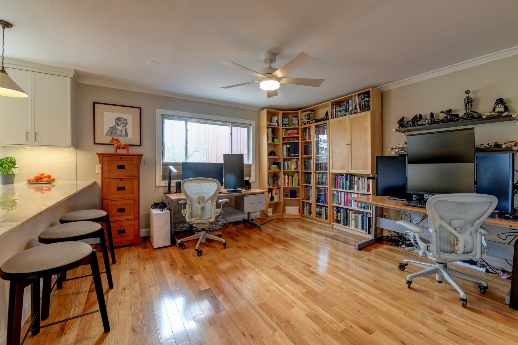 598 Sanderling Court, Unit 598 Secaucus, NJ 07094 - Photo 6 of 22 a view of a livingroom with workspace and a window