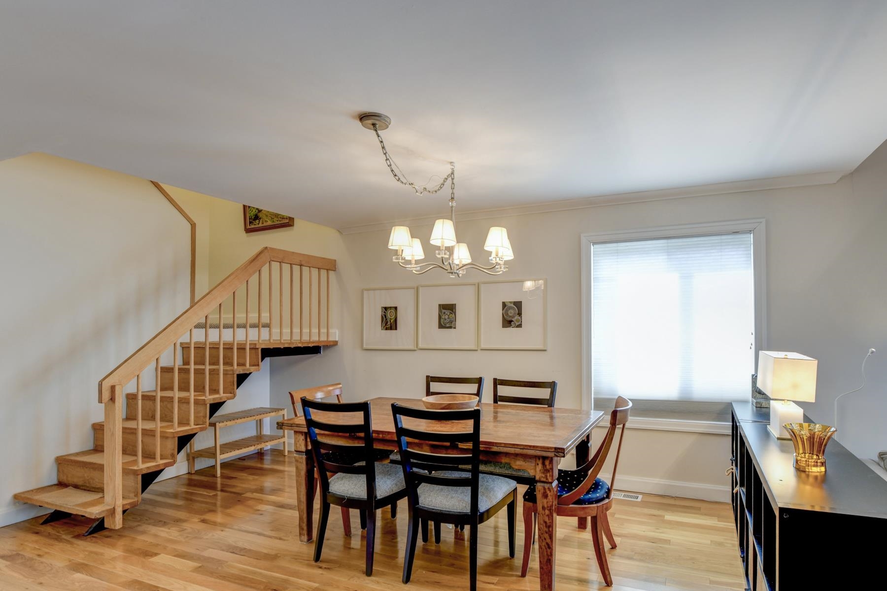 598 Sanderling Court, Unit 598 Secaucus, NJ 07094 - Photo 7 of 22 a view of a dining room with furniture and wooden floor