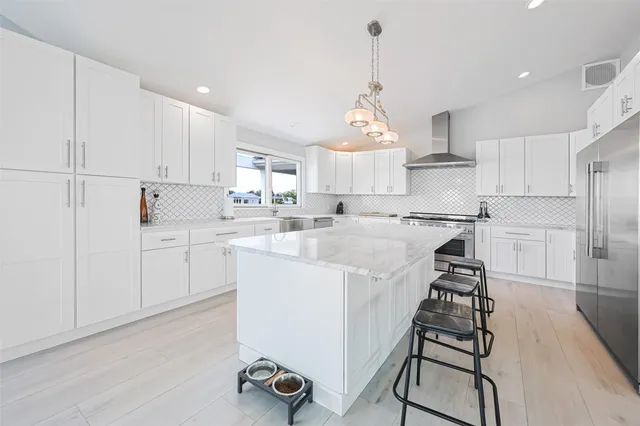 $1,930,000 | 390 East Shore Road, Lindenhurst, NY 11757