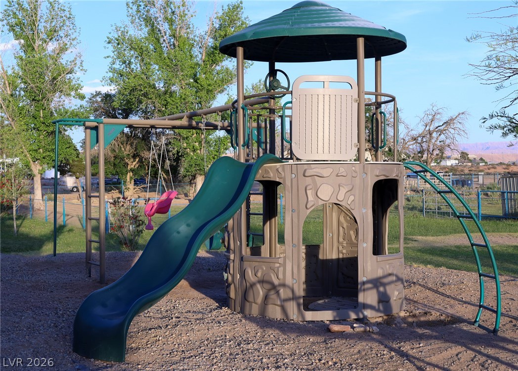 2775 Taylor Street Logandale, NV 89021 - Photo 40 of 41 This vibrant playground offers engaging outdoor fun for all ages.