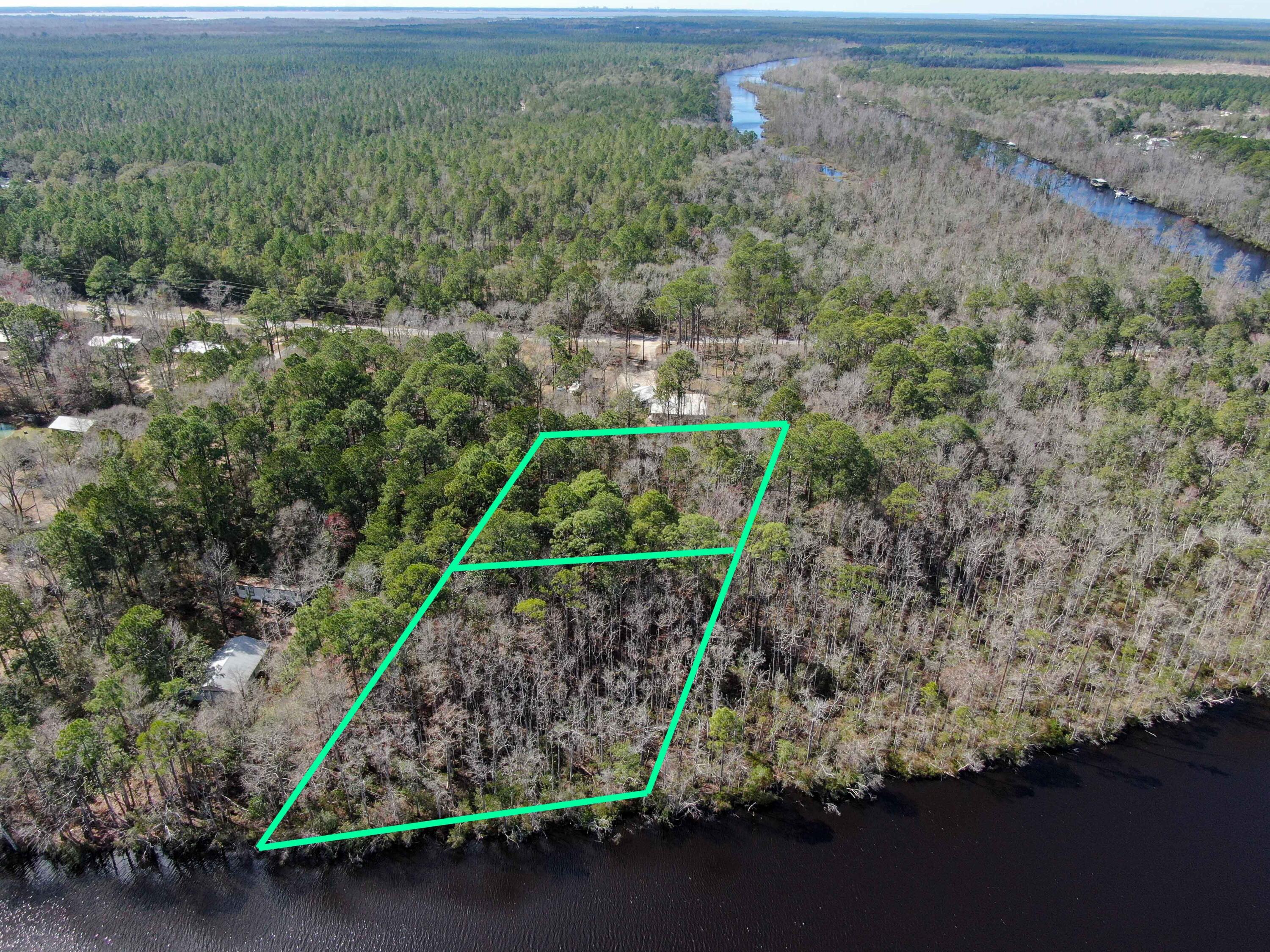 2 Acres County Highway Freeport, FL 32439 - Photo 11 of 14 an aerial view of a residential houses with outdoor space