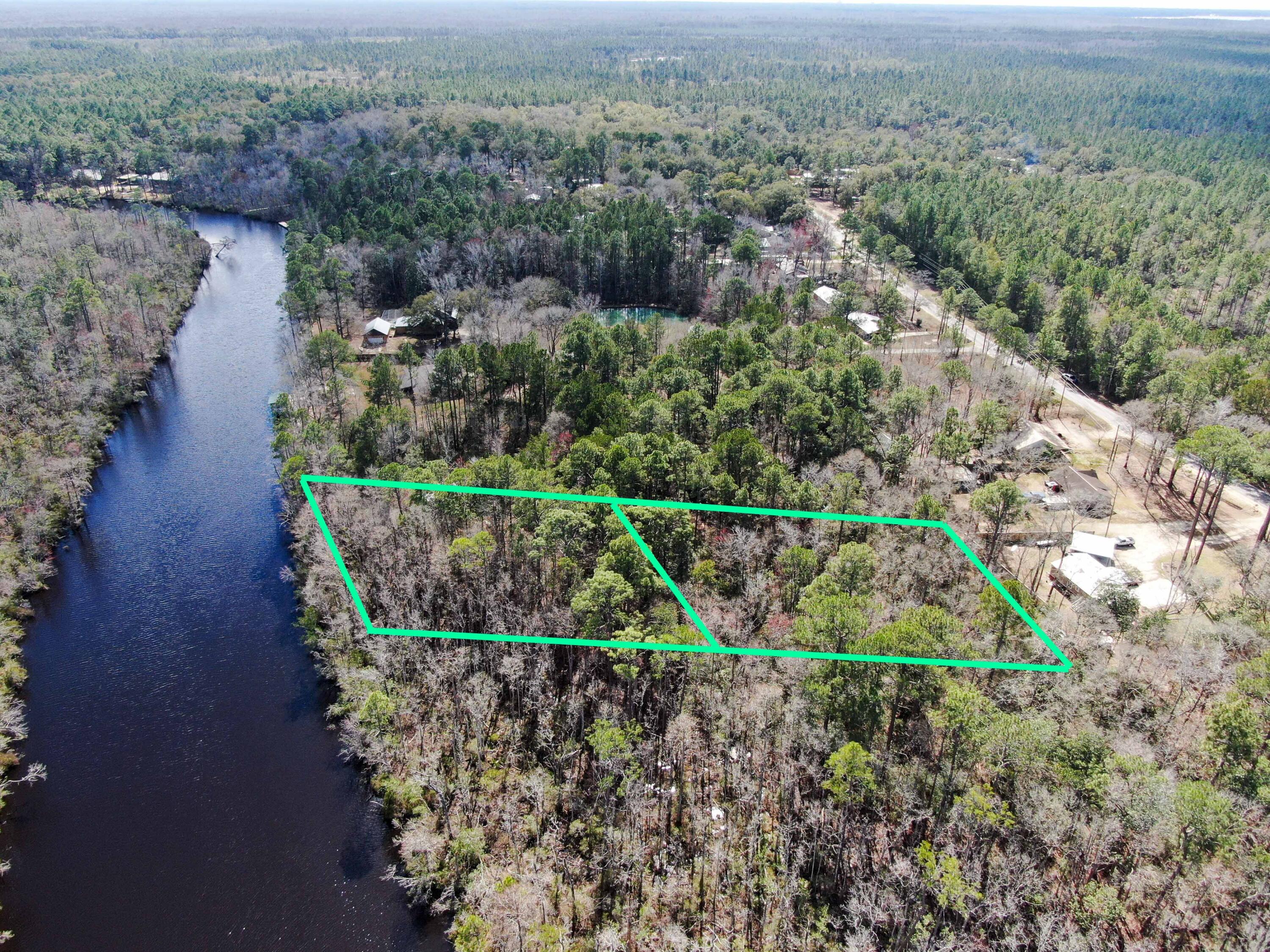 2 Acres County Highway Freeport, FL 32439 - Photo 12 of 14 an aerial view of a house with a yard