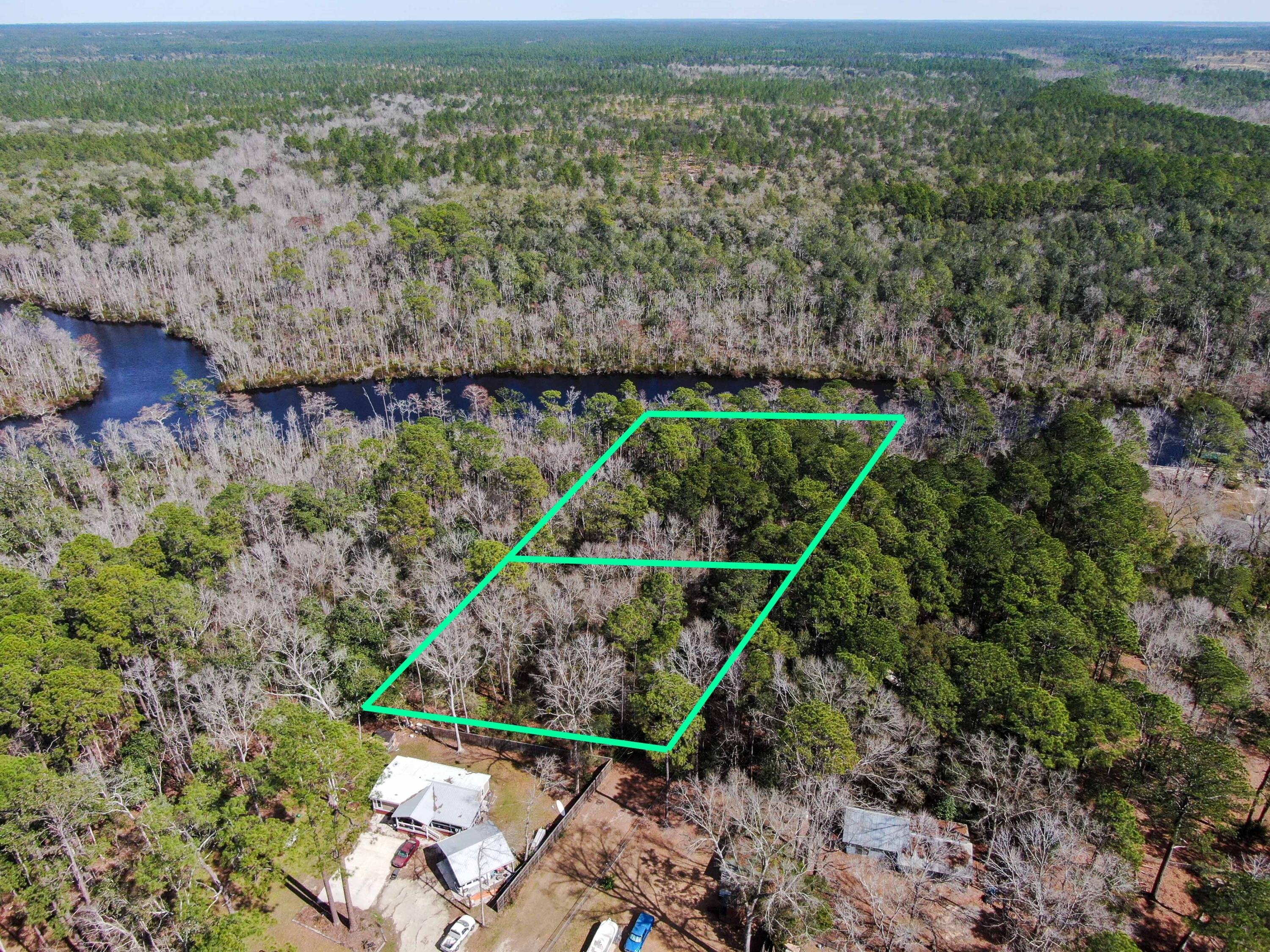 2 Acres County Highway Freeport, FL 32439 - Photo 3 of 14 a aerial view of a house with a yard