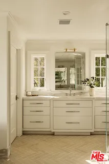 a view of a storage and utility room in a kitchen