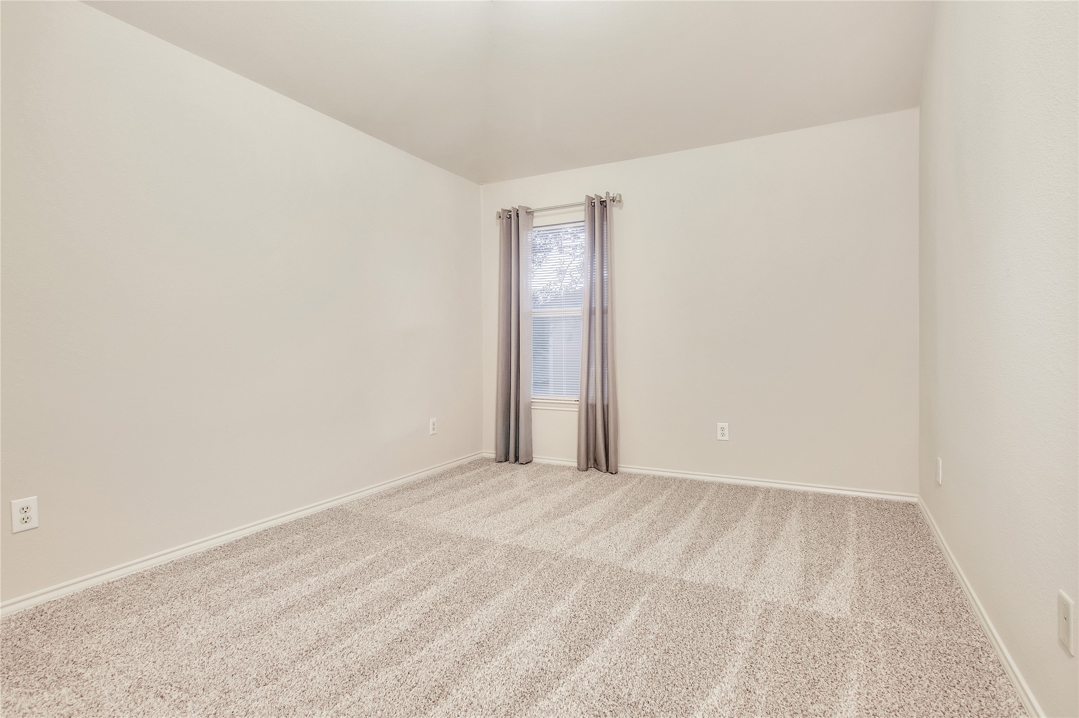 16518 Strathmore Manor Lane Houston, TX 77090 - Photo 21 of 25 a view of an empty room