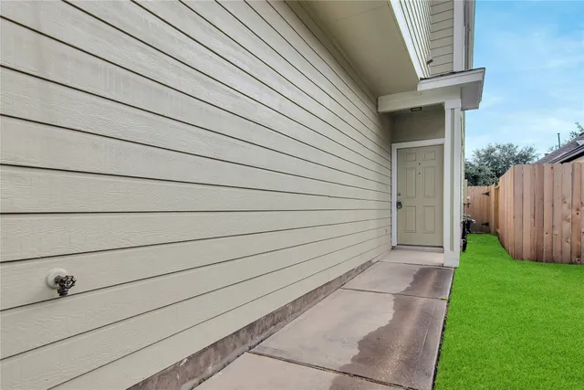 a view of a back yard of the house