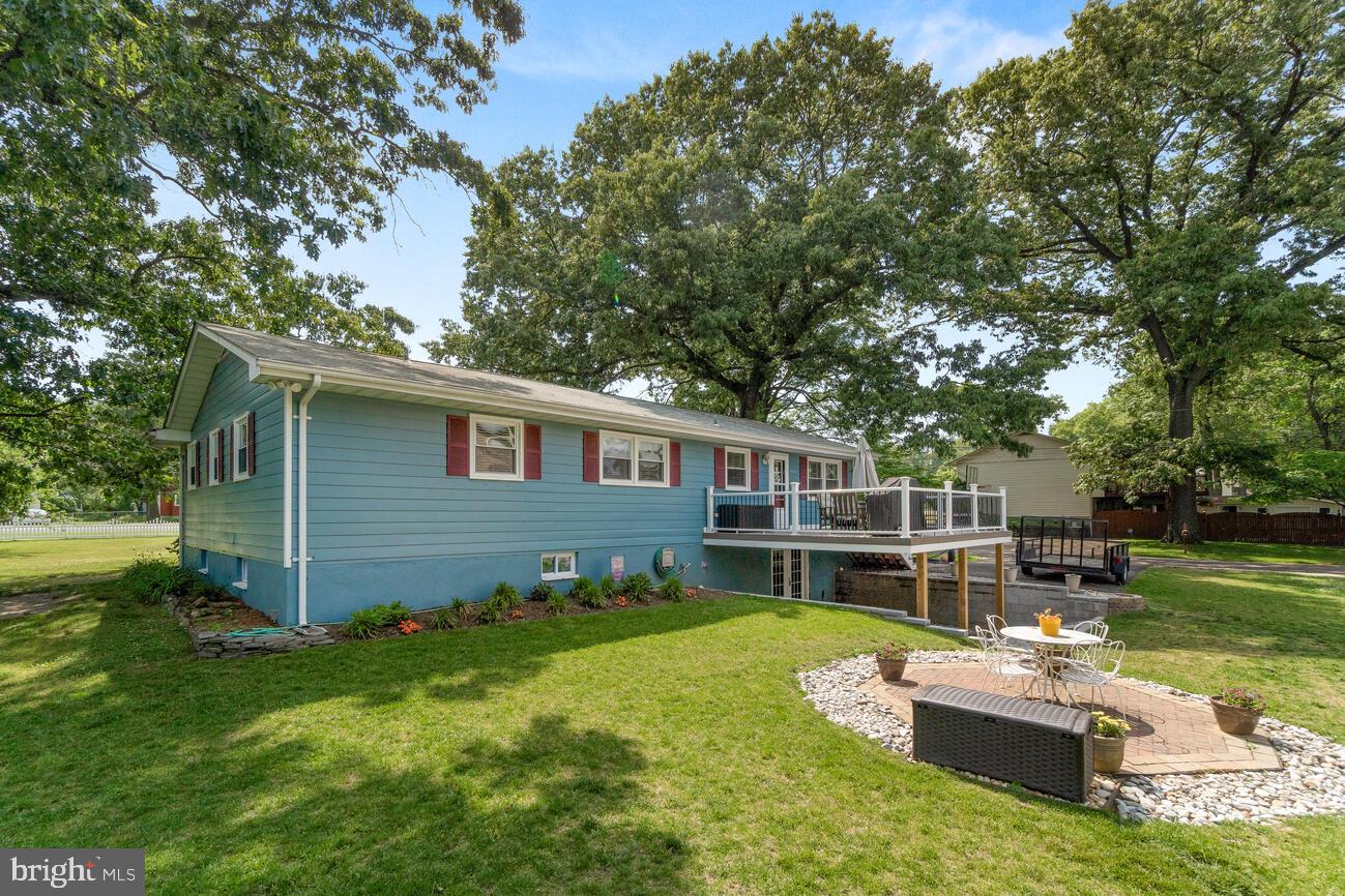 968 Annapolis Road Gambrills, MD 21054 - Photo 6 of 33 Rear of house with stone patio area