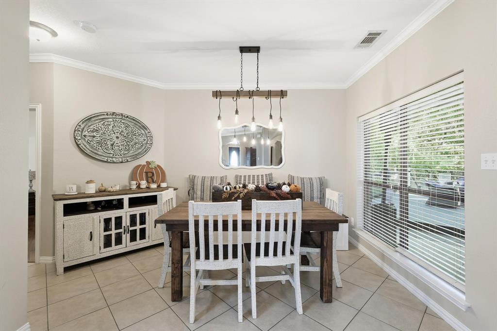 1805 Spinnaker Lane Azle, TX 76020 - Photo 12 of 40 a view of a dining room with furniture window and outside view