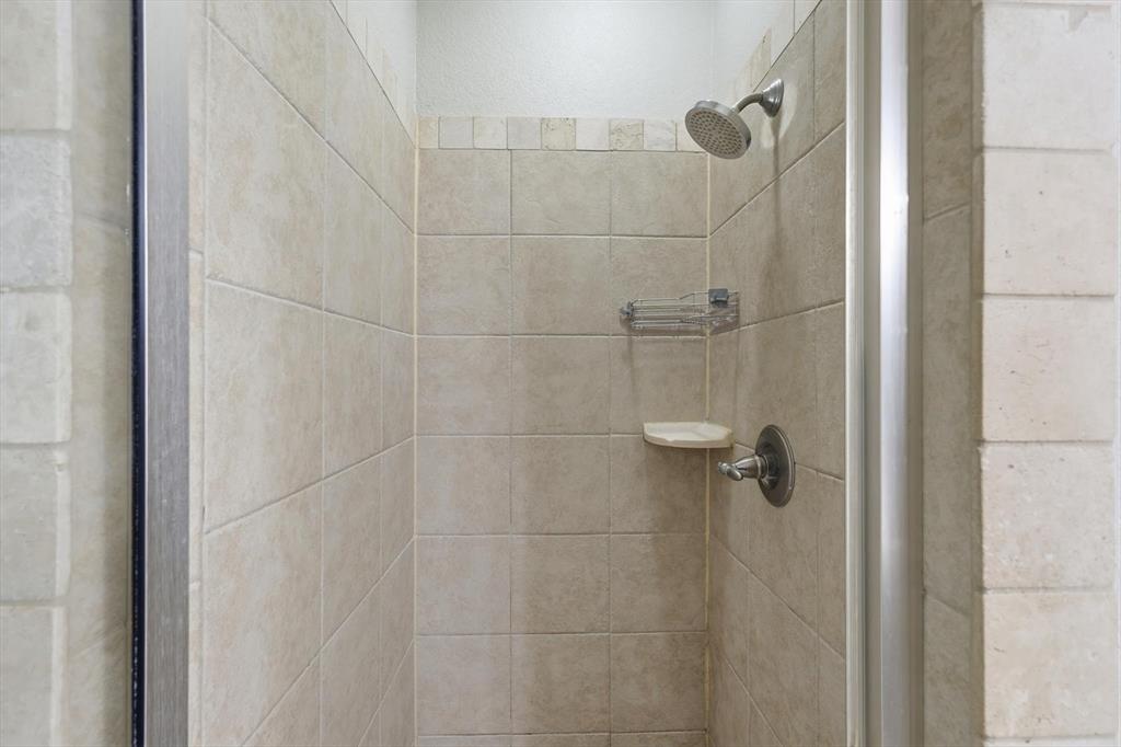 1805 Spinnaker Lane Azle, TX 76020 - Photo 24 of 40 a bathroom with a shower