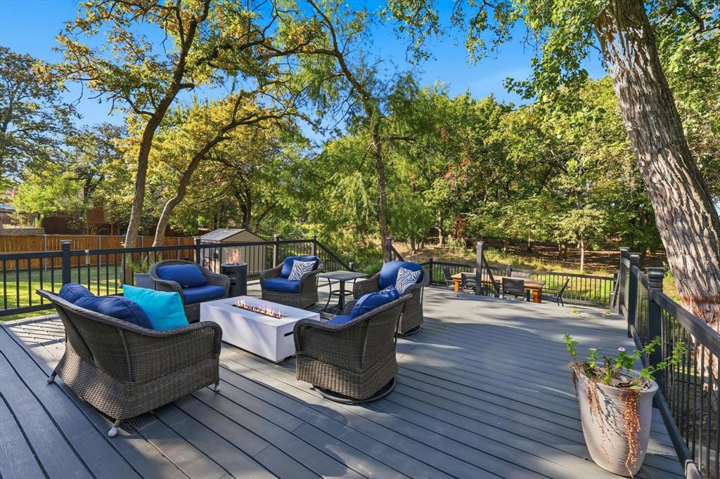 1805 Spinnaker Lane Azle, TX 76020 - Photo 31 of 40 a view of a patio with couches chairs and a potted plant