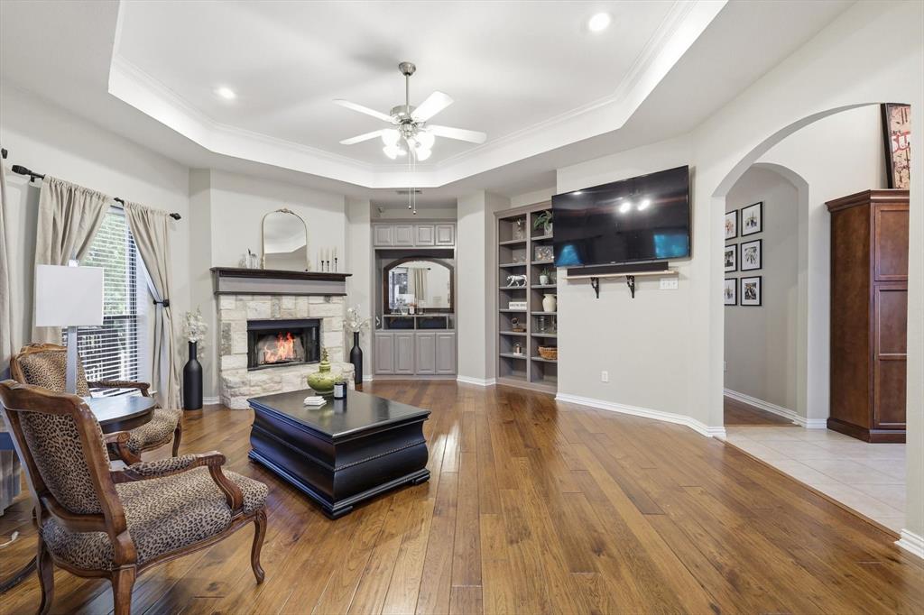 1805 Spinnaker Lane Azle, TX 76020 - Photo 9 of 40 a living room with furniture and a flat screen tv
