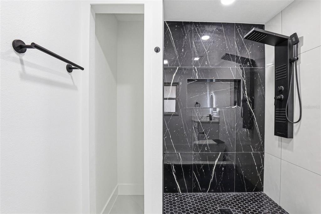 3216 West Beach Street Tampa, FL 33607 - Photo 31 of 63 a bathroom with a shower