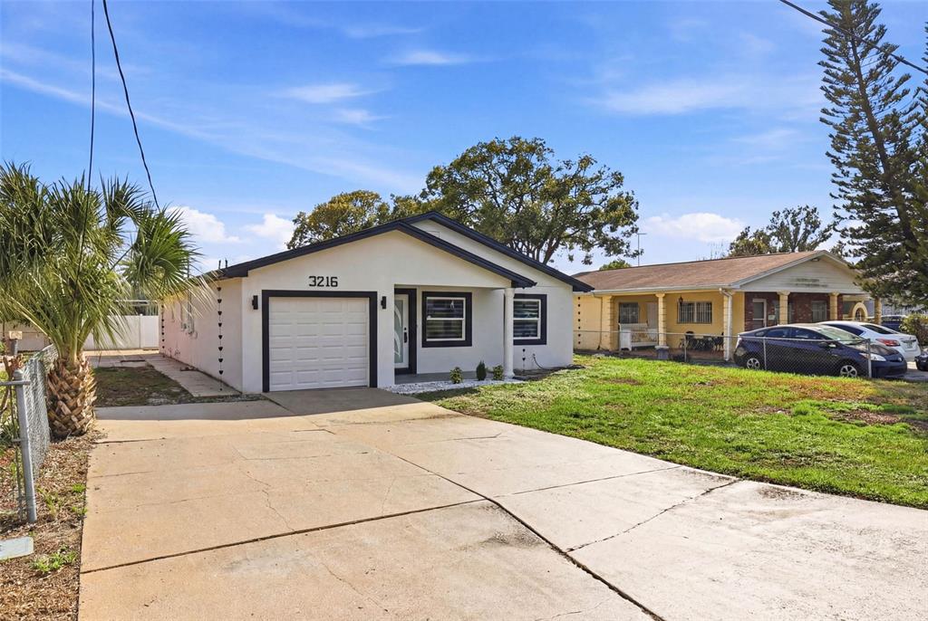 3216 West Beach Street Tampa, FL 33607 - Photo 59 of 63 a view of a house with a yard
