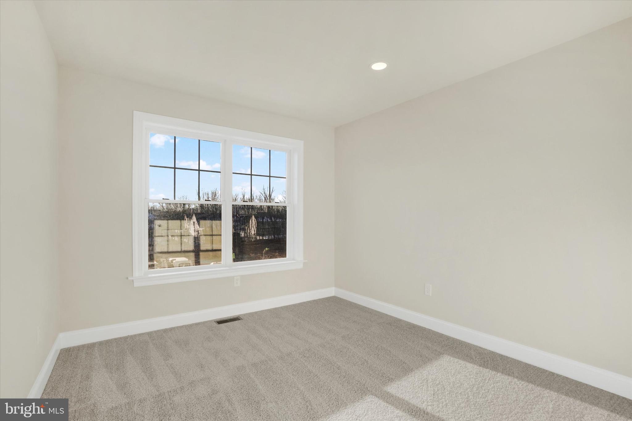 145 Eli Drive York, PA 17404 - Photo 17 of 20 an empty room with a window