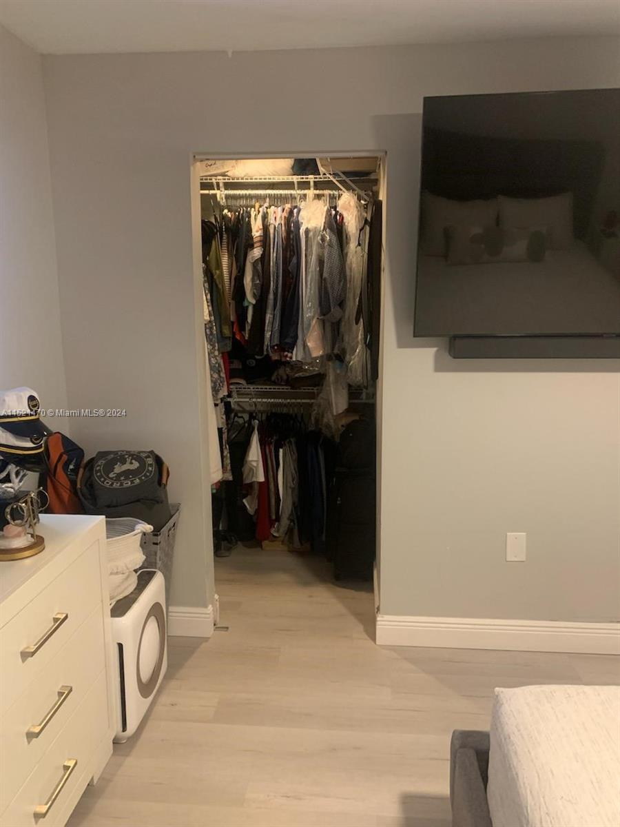 4590 Southwest 68th Ct Circle, Unit 4 Miami, FL 33155 - Photo 17 of 32 a utility room with dryer and washer