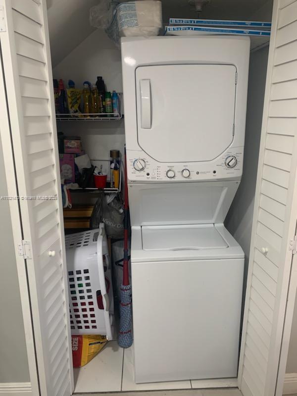 4590 Southwest 68th Ct Circle, Unit 4 Miami, FL 33155 - Photo 19 of 32 a close up view of washer and dryer