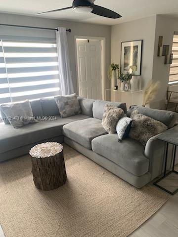 4590 Southwest 68th Ct Circle, Unit 4 Miami, FL 33155 - Photo 20 of 32 a living room with furniture and a window