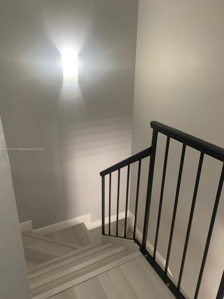 4590 Southwest 68th Ct Circle, Unit 4 Miami, FL 33155 - Photo 31 of 32 a view of a hallway