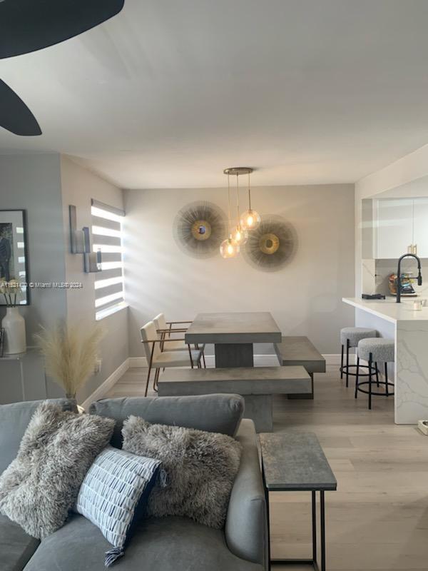 4590 Southwest 68th Ct Circle, Unit 4 Miami, FL 33155 - Photo 5 of 32 a living room with furniture and a couch