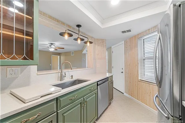 a bathroom with a sink a mirror and a shower