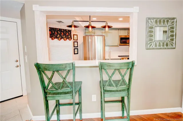 a bathroom with a window and a table