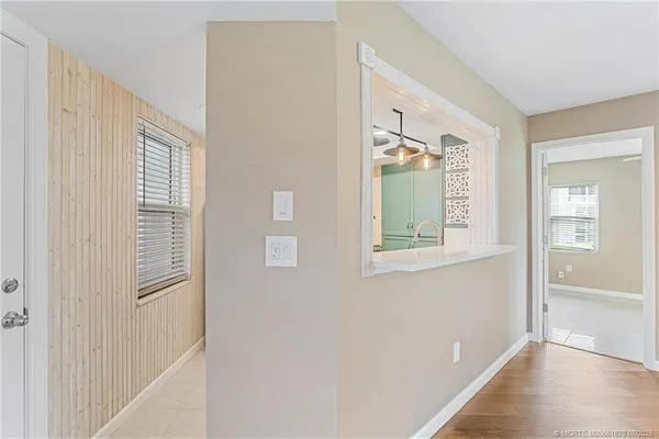 a view of a room that has a window in it