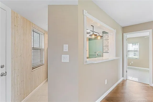 a view of a room that has a window in it