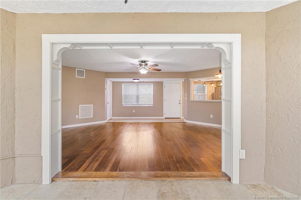 3218 Southeast Aster Lane, Unit P116 Stuart, FL 34994 - Photo 34 of 45 view of an empty room with wooden floor and a window