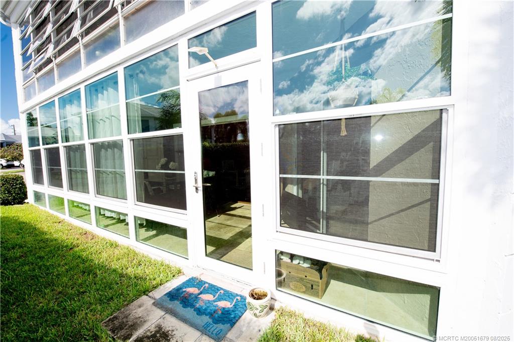 3218 Southeast Aster Lane, Unit P116 Stuart, FL 34994 - Photo 7 of 45 a view of front door