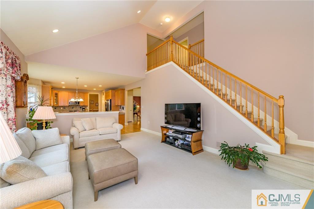 3 Victoria Court Cream Ridge, NJ 08514 - Photo 13 of 38 a living room with furniture and a flat screen tv
