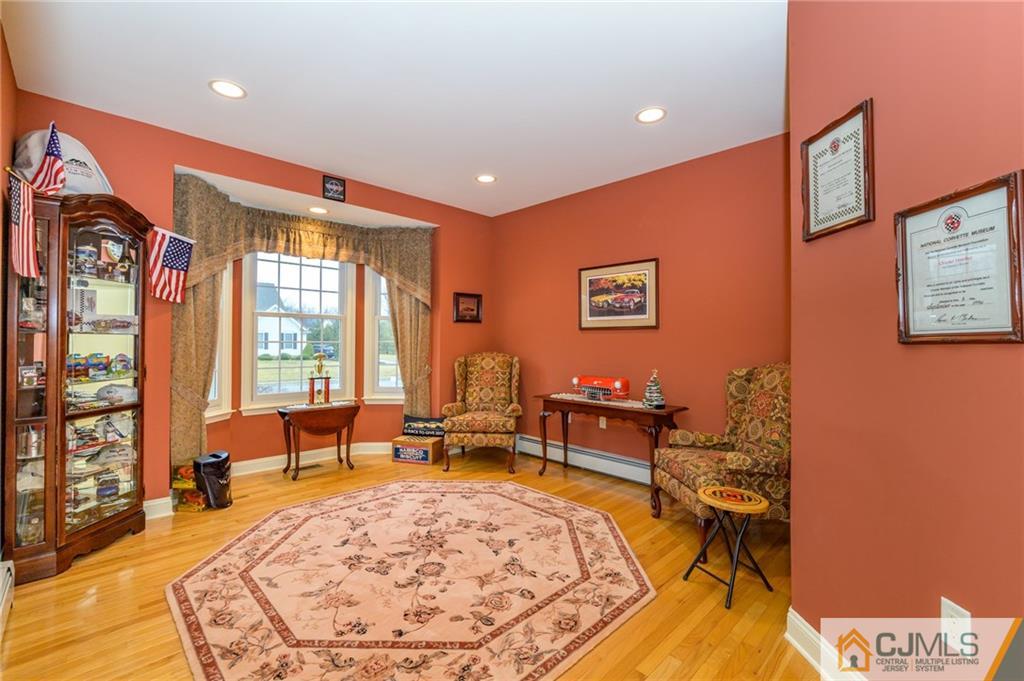 3 Victoria Court Cream Ridge, NJ 08514 - Photo 17 of 38 a living room with furniture and a large window