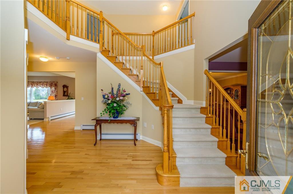 3 Victoria Court Cream Ridge, NJ 08514 - Photo 3 of 38 a view of entryway and hall with wooden floor
