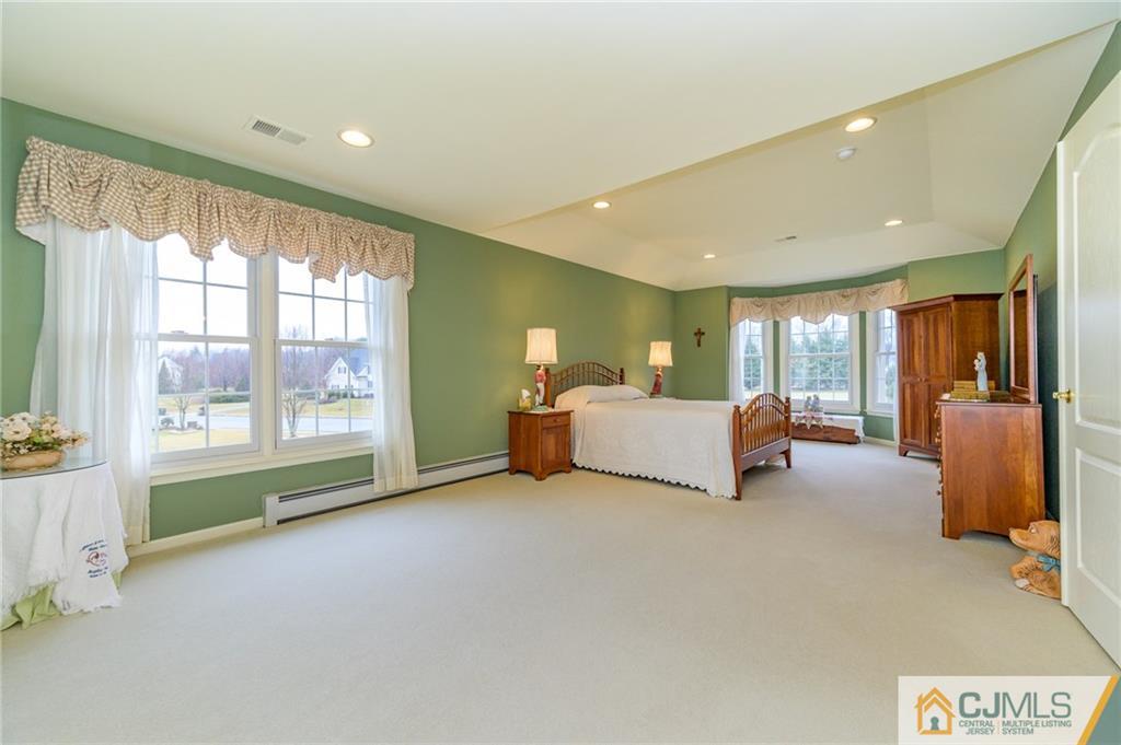 3 Victoria Court Cream Ridge, NJ 08514 - Photo 27 of 38 a bed room with a bed and a large window