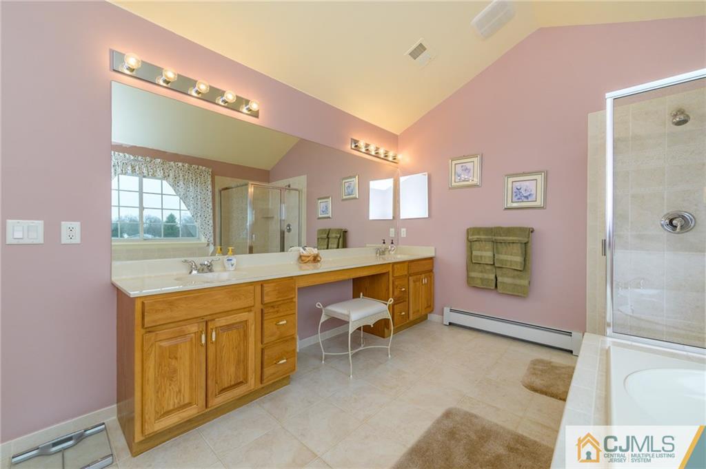 3 Victoria Court Cream Ridge, NJ 08514 - Photo 28 of 38 a large bathroom with a large tub and sink