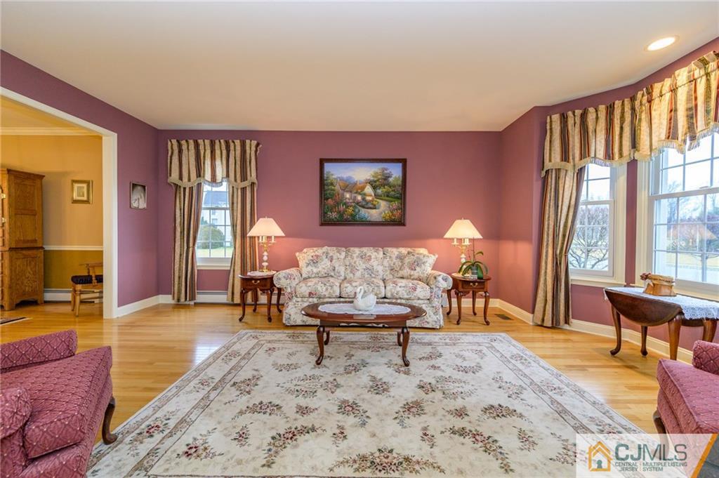 3 Victoria Court Cream Ridge, NJ 08514 - Photo 5 of 38 a living room with furniture and a large window
