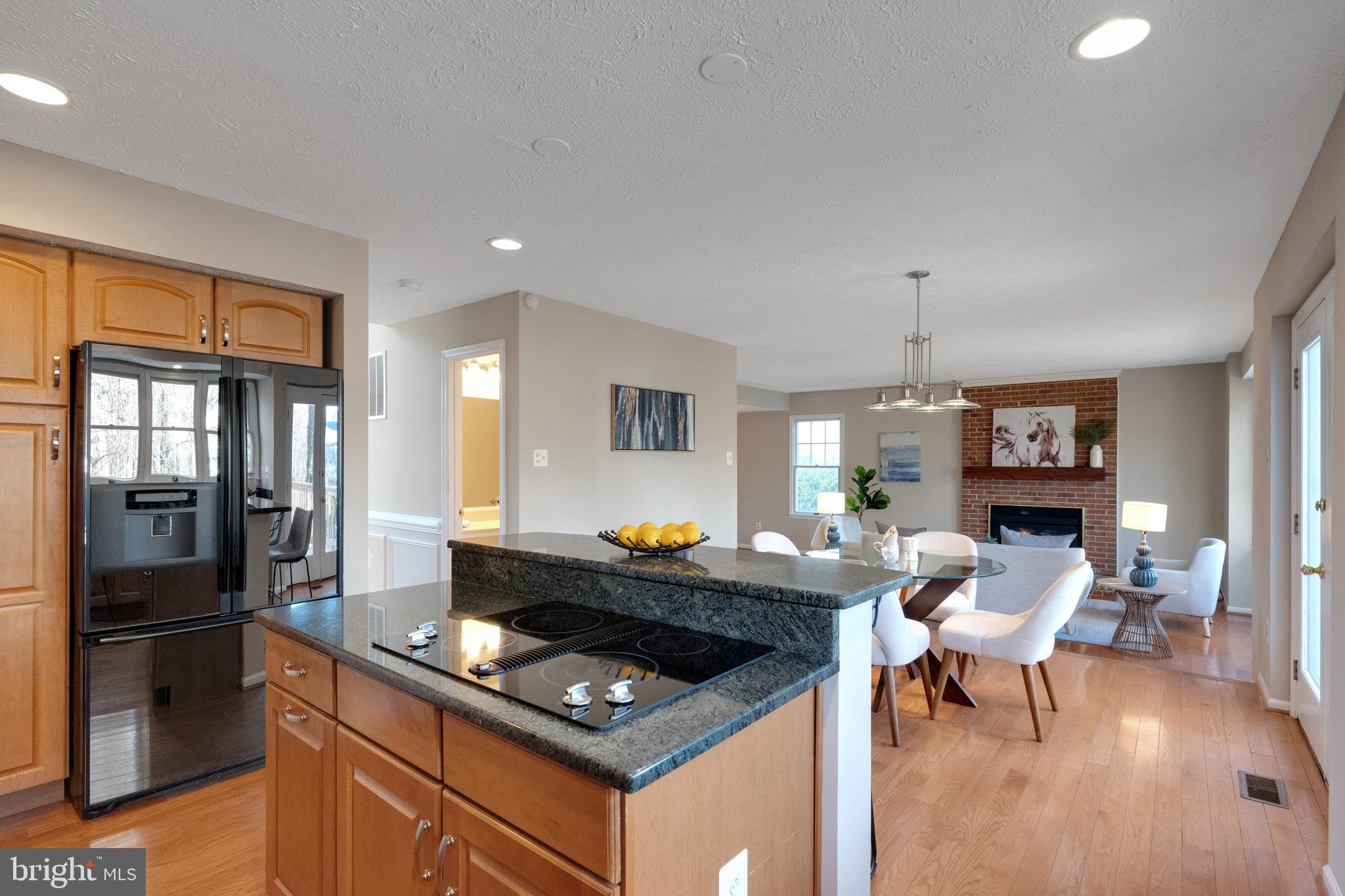 13472 Bregman Road Silver Spring, MD 20904 - Photo 8 of 32 Kitchen is open to the family room