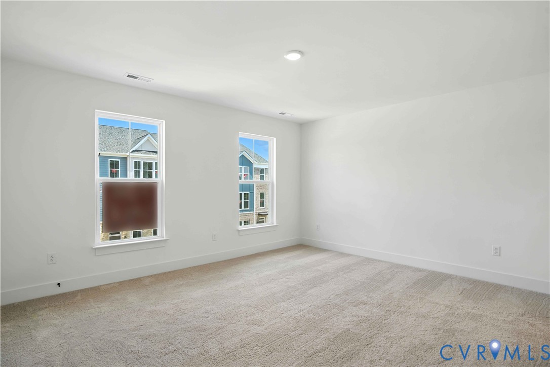 11927 Evening Loop Henrico, VA 23233 - Photo 18 of 37 an empty room with windows