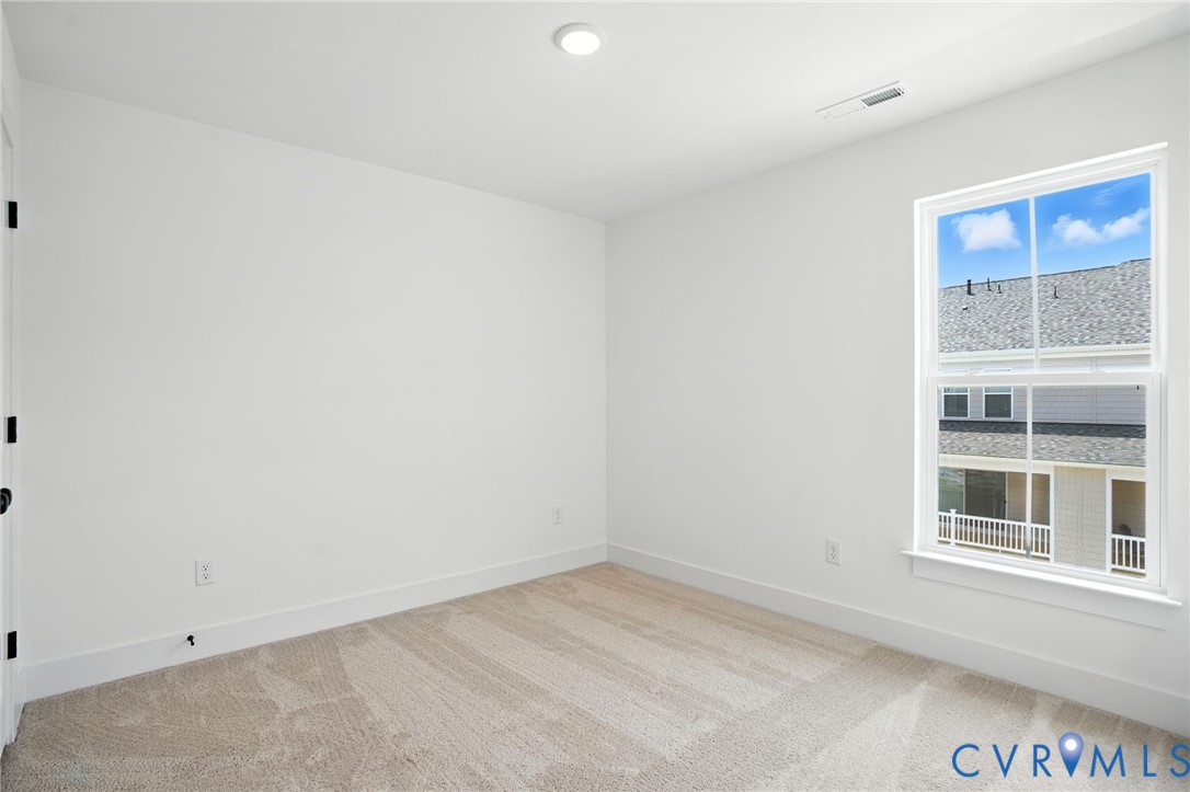 11927 Evening Loop Henrico, VA 23233 - Photo 21 of 37 an empty room with a window