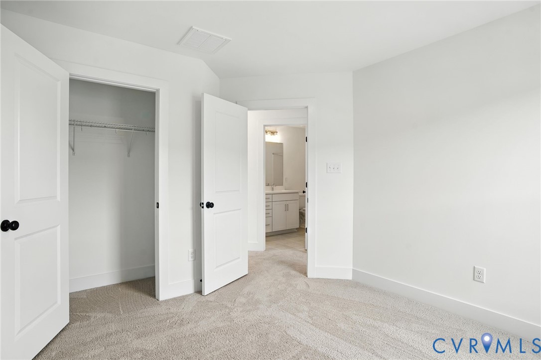 11927 Evening Loop Henrico, VA 23233 - Photo 22 of 37 an empty room with a bathroom