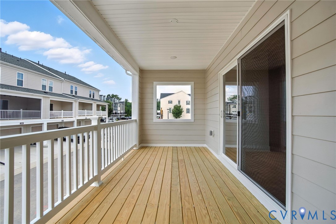 11927 Evening Loop Henrico, VA 23233 - Photo 24 of 37 a view of a balcony with wooden floor