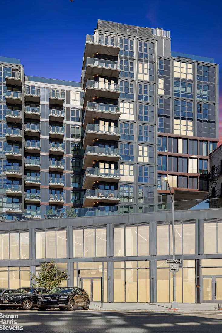 11 Hancock Place, Unit PH206 Manhattan, NY 10027 - Photo 13 of 14 a front view of a building with glass windows