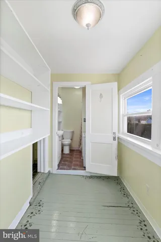 a view of a room with racks on the wall