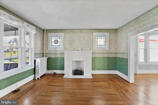 a bathroom with a sink toilet and a mirror