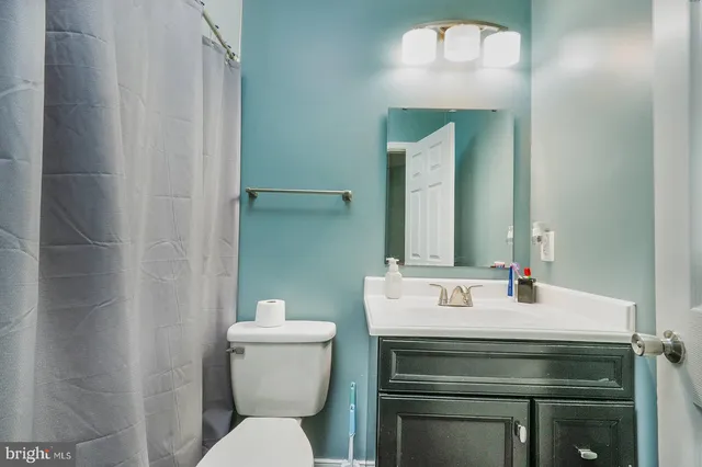 a bathroom with a sink and a toilet