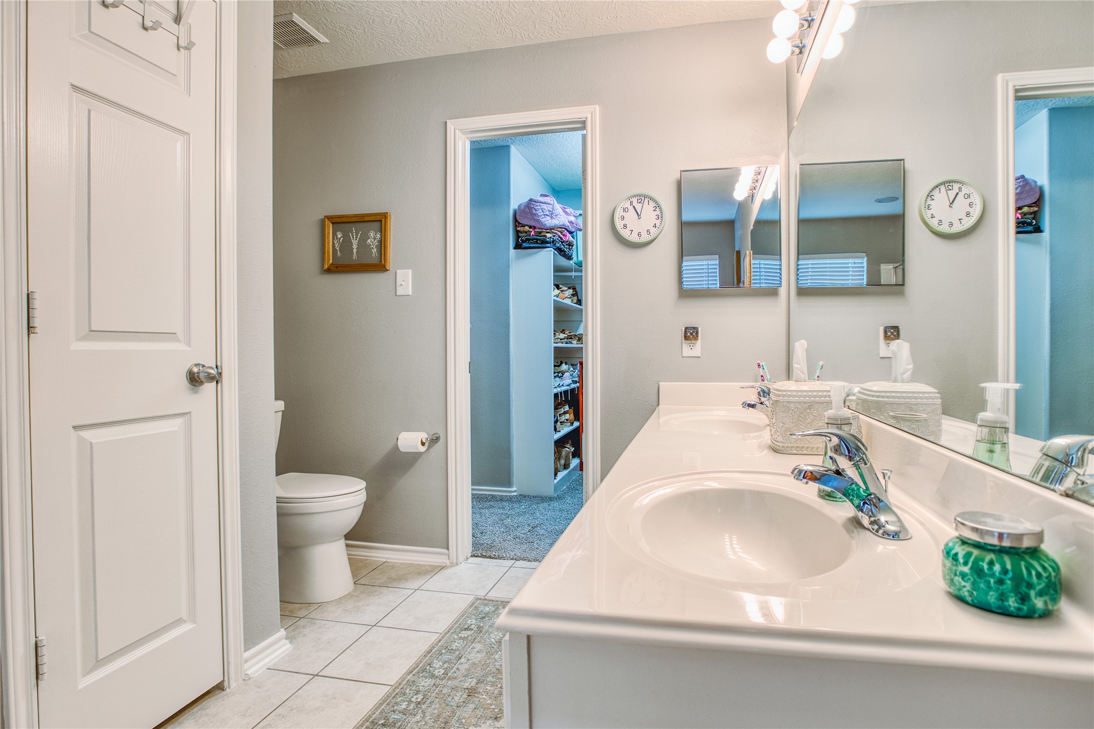 280 Brandy Ridge Lane Dickinson, TX 77539 - Photo 18 of 27 a bathroom with a sink a toilet and shower curtain