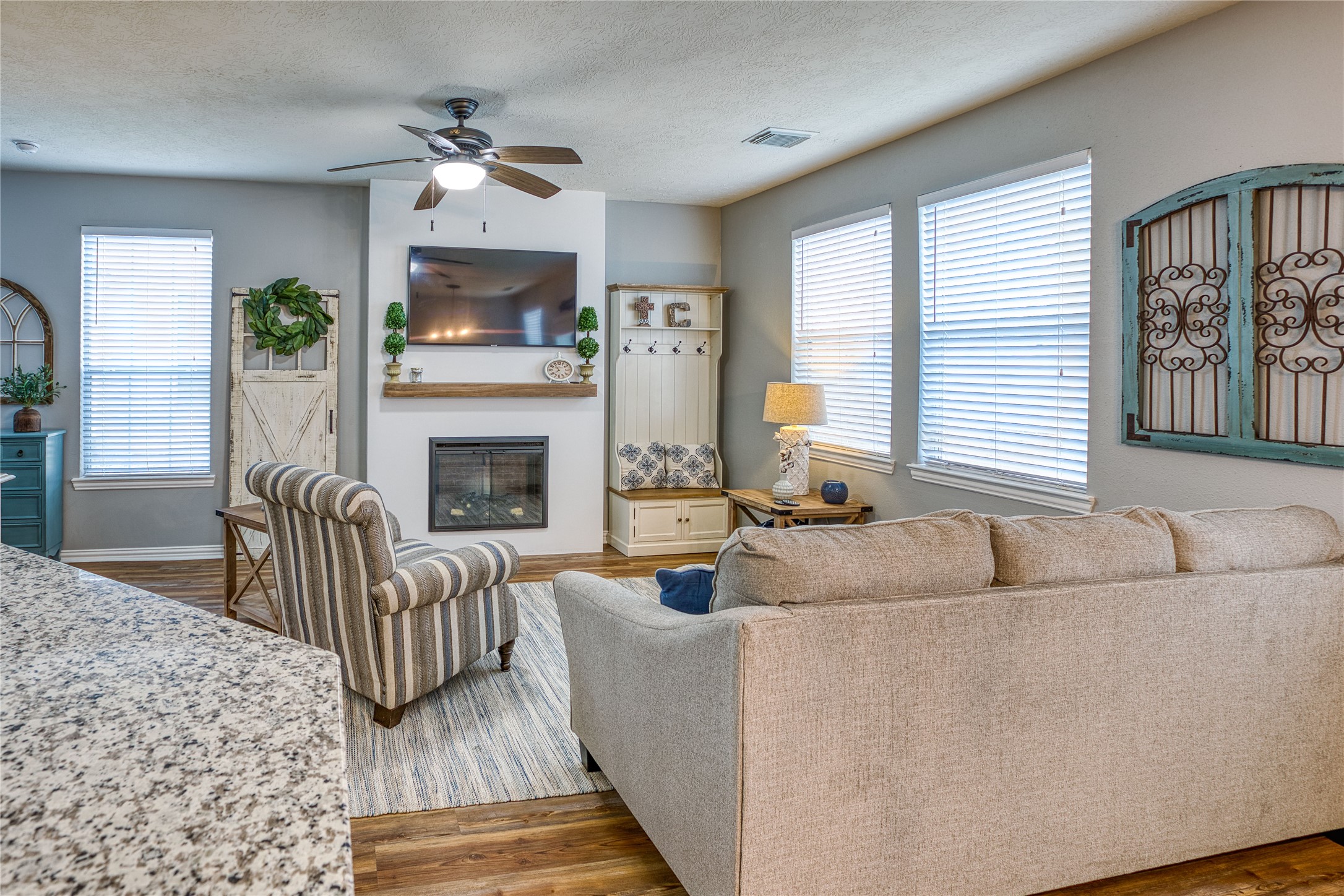280 Brandy Ridge Lane Dickinson, TX 77539 - Photo 5 of 27 a living room with furniture and a fireplace