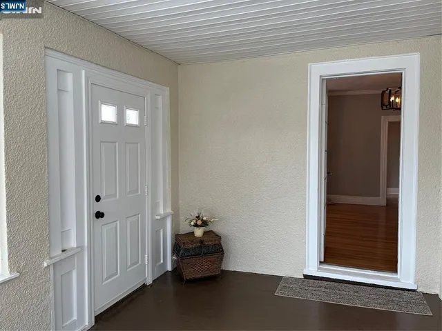 a kitchen with stainless steel appliances granite countertop wooden cabinets stove top oven and sink